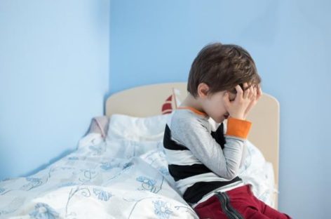 My child is 7 and wets his bed. Should I be worried?