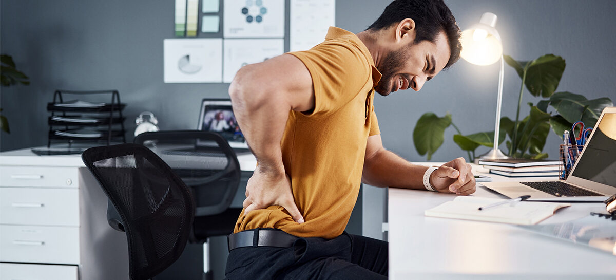 When did back pain become part of having a desk job?