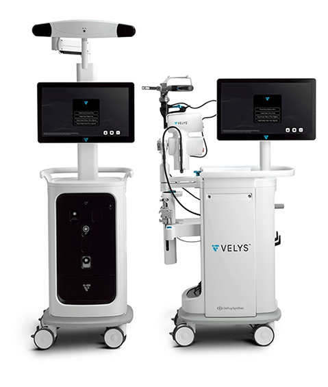VELYS robotic knee replacement system with dual monitors and surgical precision equipment used for advanced knee surgery